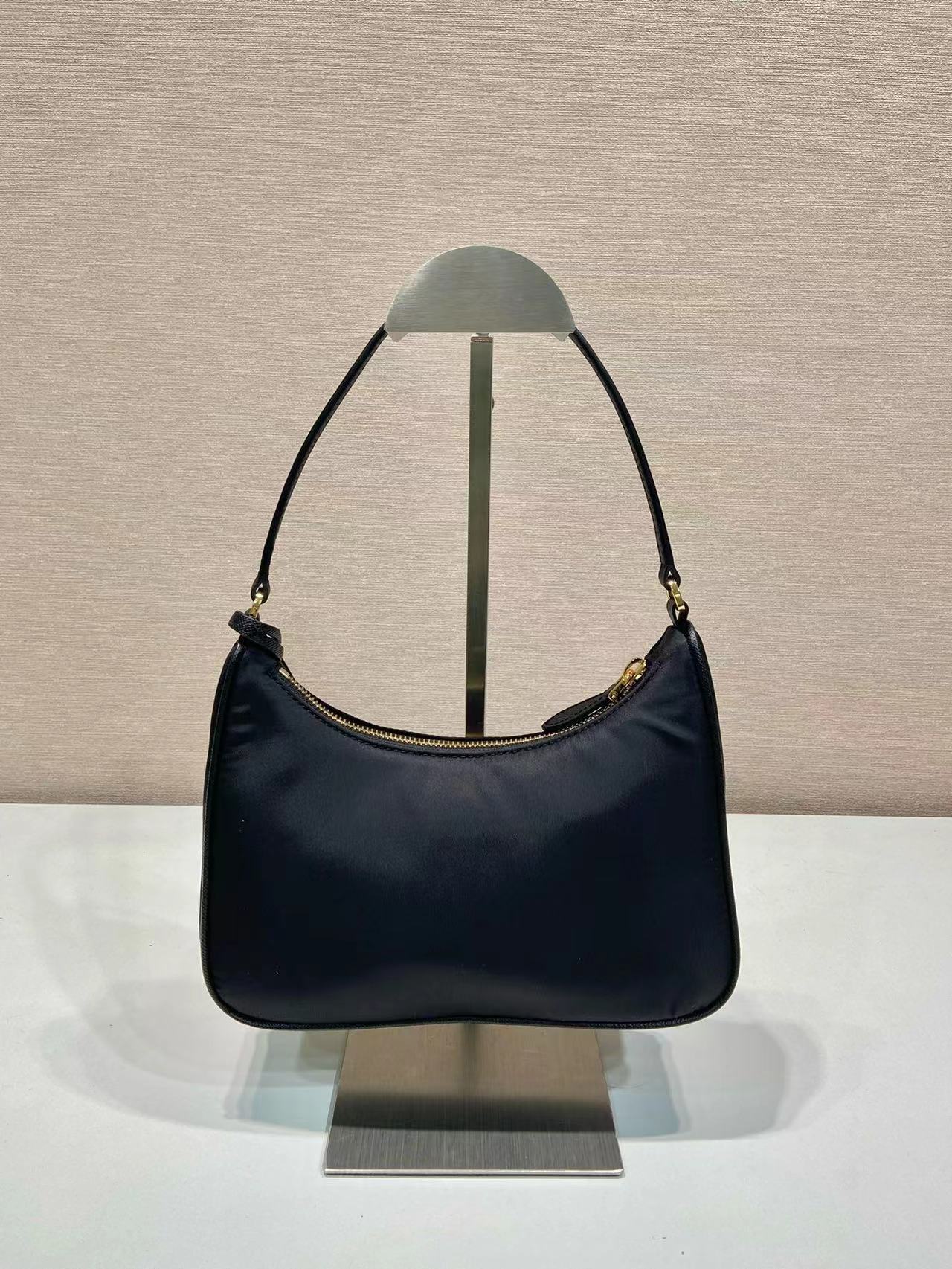 Prada Re-Nylon and brushed leather mini-bag 1BC515 black Prada Re-Nylon and brushed leather mini-bag 1BC515 black