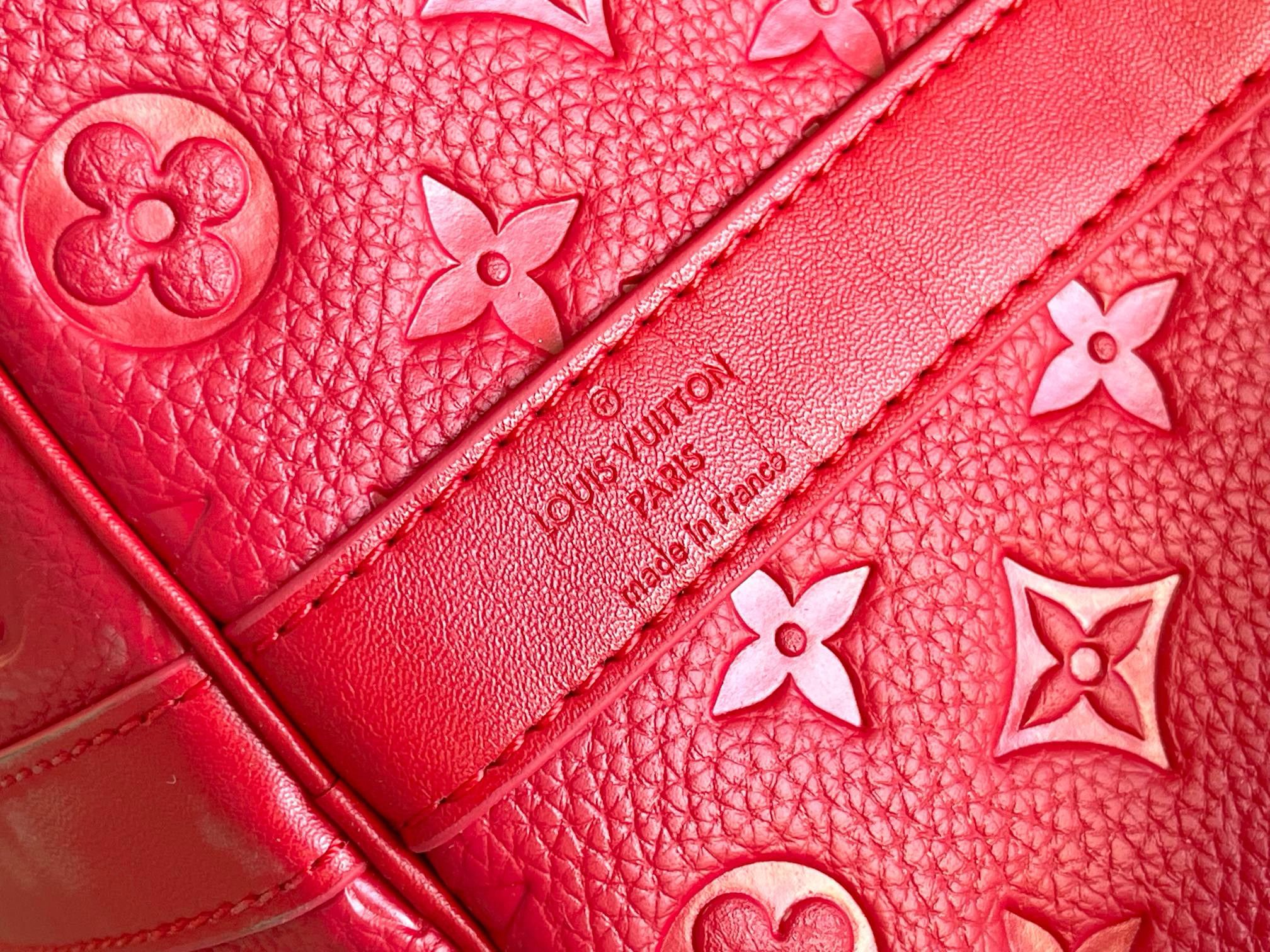 Louis Vuitton Monogram Empreinte Keepall 50 Strap N41416 Red Louis Vuitton Monogram Empreinte Keepall 50 Strap N41416 Red