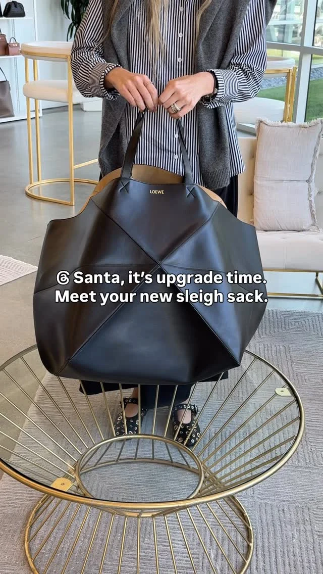 Santa, babe, the sack is not slaying. May we suggest a Loewe Puzzle Tote?